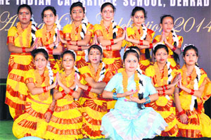 Students of The Indian Cambridge School perform during the annual day celebrations in Dehradun on Saturday. A Tribune photograph