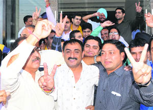 Members of the Amritsar Chemists Association and newly elected office-bearers celebrate after the elections in Amritsar on Sunday