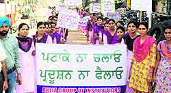 Students and staff of the Akalia Group of Institutions take out an anti-cracker rally in Bathinda on Sunday