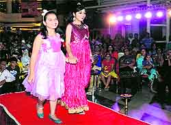 Young girls walk the ramp during a fashion show held in Bathinda on Sunday