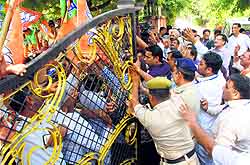 Policemen were unable to stop supporters from going inside the Bel Colony after Gian Chand Guptas victory in Panchkula
