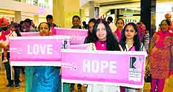 Members of the Rani Breast Cancer Trust take part in a walkathon at Elante Mall in Chandigarh on Sunday