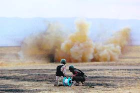 Kurdish Peshmerga fighters detonate a landmine laid by the Islamic State fighters in the Gwer district, 40 km from Arbil, the capital of the Kurdish autonomous region in northern Iraq