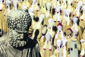 Pope beatifies Paul VI: The statue of St. Peters is back dropped by prelates waiting for the start of the beatification ceremony of Pope Paul VI at the Vatican on Sunday