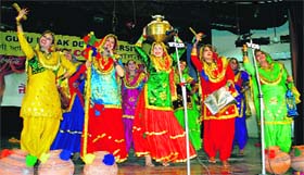 Students present giddha at Guru Nanak Dev University in Amritsar on Monday.