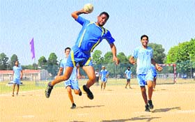 Players in action during a handball match between GGDSD College and GN College, Narangwal, at Panjab University in Chandigarh on Monday