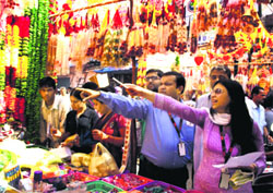 People shop for Diwali in Gurgaon on Monday. Tribune photo Sayeed Ahmed
