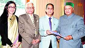 Members of the committee constituted to look into the issue of fee hike by the Himachal Pradesh University submits its report to Chief Minister Virbhadra Singh in Shimla on Monday. 