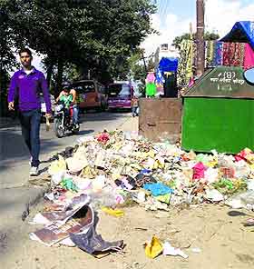 A heap of garbage on the Dharamsala road in Kangra on Monday. 