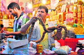 A file photograph of a dry fruit seller at Lal Chowk in Srinagar