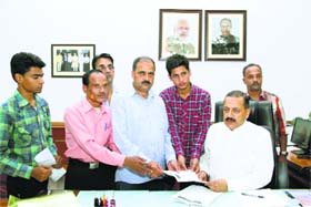 Union Minister Jitendra Singh receives a memorandum from J&K students at New Delhi on Monday