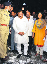 Police officials visit the blast scene at Vakatippa in East Godavari district on Monday.