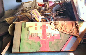 A model of Mukte Minar lies amid junk items at the District Administrative Complex in Muktsar. 