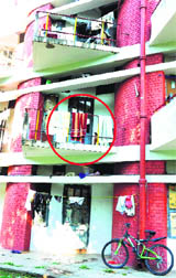 The balcony (encircled) from where the youth fell to death at PU Hostel No. 4. 