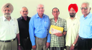 (From left) Bhupinder Singh, SL Vinayak, Narinder Sharma, KL Bhargava, Kishen Singh and Rajeshwar Sharma, all members of the Punjab Irrigation Retired Engineers Association, donate a cheque for ~6.31 lakh