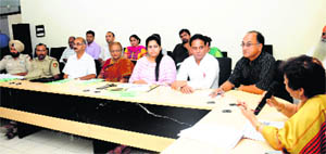 Chairperson of the Chandigarh Commission for Protection of Child Rights Devi Sirohi addresses police officials and representatives of various NGOs at Maloya on Tuesday