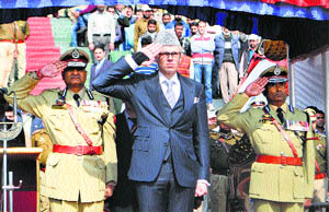 Chief Minister Omar Abdullah takes the salute during the Police Commemoration Day ceremony at Zewan on the outskirts of Srinagar on Tuesday