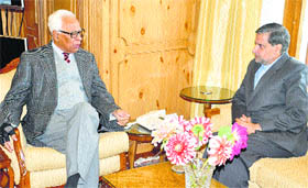 Governor NN Vohra with Minister for Forests, Environment and Ecology Mian Altaf at Raj Bhawan in Srinagar on Tuesday