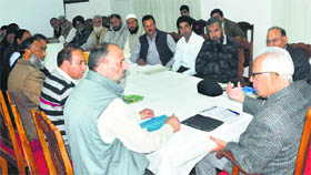 Governor NN Vohra meets a delegation of the Kashmir Traders and Manufacturers Federation at Raj Bhawan in Srinagar on Tuesday