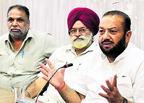 Office-bearers of the Baba Vishwakarma International Foundation address a press conference. 