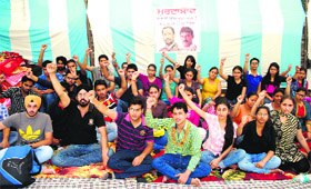 Students of Chintpurni Medical College stage a protest outside the Government Medical College in Amritsar on Wednsday