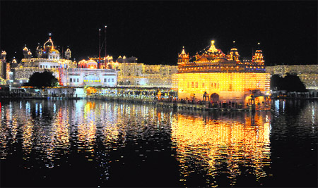 An illuminated Golden Temple on the eve of Diwali in Amritsar on Wednesday