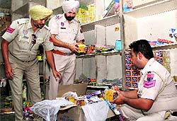 Police officials raid a cracker shop near Quila Road in Bathinda on Wednesday