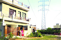 Installation of pylons has increased the number of houses prone to high-tension wires at 