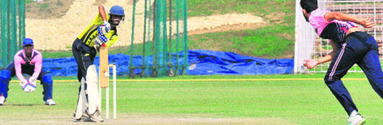 Players in action during a match between Amritsar and Jalandhar at the cricket stadium in Sector 16, Chandigarh, on Wednesday. Tribune Photo: S Chandan