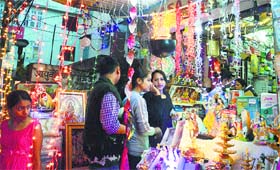 Up for grabs: Decorative items on display on the eve of Diwali in Mandi on Wednesday