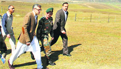 Chief Minister Omar Abdullah along with GOC 15 Corps Lt General Subrata Saha and MoS for Home Sajjad Ahmad Kitchloo visits Tosa Maidan on Wednesday. Tribune photo: Amin War