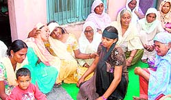 Aggrieved family members of Balwinder who was murdered at Cooperative Bank at Talwan village in Jalandhar on Wednesday