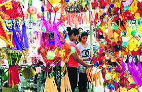 Residents purchase decorative items for Diwali in Ludhiana on Wednesday. 