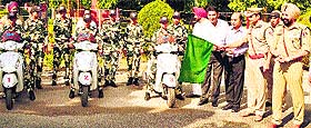 Deputy Inspector General of Police, Patiala, Shiv Kumar Verma flags off the women PCR squad at Sangrur. 