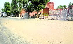 The road that recently got damaged in Badal village