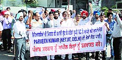 Activists of PTU Learning Centre Association protest in Jalandhar on Wednesday