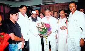 People greet Chief Minister Harish Rawat on Diwali eve in Dehradun on Wednesday. a tribune photograph