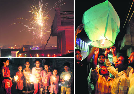 Crackers light up the sky; residents release a sky lantern; and children burn sparklers on the night of Diwali in Bathinda on Thursday.