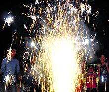 Children light crackers and celebrate Diwali in Gurgaon on Thursday