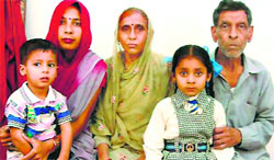 Parents and family members of Sandeep Rana in Jawali.