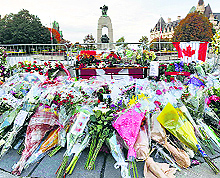 A makeshift memorial in front of the National War Memorial in Ottawa