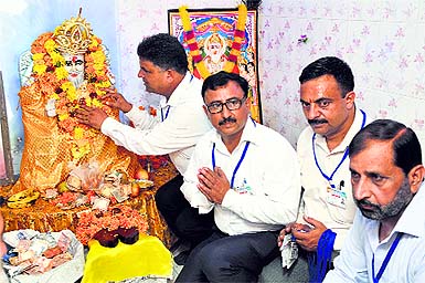 Devotees worship Lord Vishwakarma in Jammu on Friday.