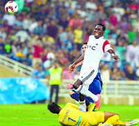 Kondwani Mtonga of NorthEast United FC scores a goal against Mumbai City FC during their Indian Super League match in Mumbai on Friday. AFP