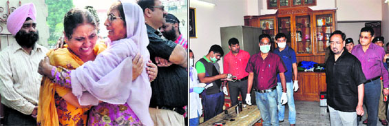 Family members of the deceased; and (right) DGP BS Sidhu at the site of the crime at Adarsh Vihar in Dehradun on Friday.
