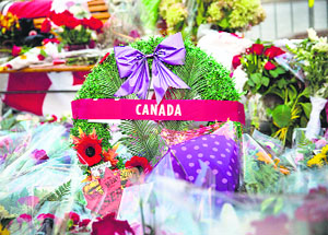 Flowers and wreaths are left in memorial of Cpl. Nathan Cirillo of the Canadian Army Reserves in Ottawa.