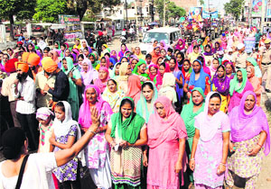 Residents participate in a procession to mark the birth anniversary of Baba Nam Dev in Bathinda on Saturday.