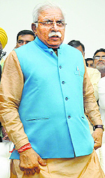 Khattars supporters like to point to similarities between him and Modi, and therefore the claim of competence