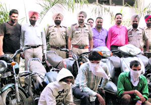 Police officials along with three arrested youths in Amritsar. 