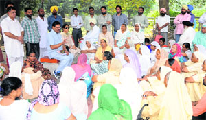 Dr BR Hastir, chairman of the All-India Terrorist Victims Association (sitting on left) holds a meeting with the family members of terrorism victims in Amritsar on Sunday