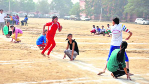 Students participate in a sports event being hosted under the DAV National Sports Cluster Tournament at DAV International School in Amritsar on Sunday